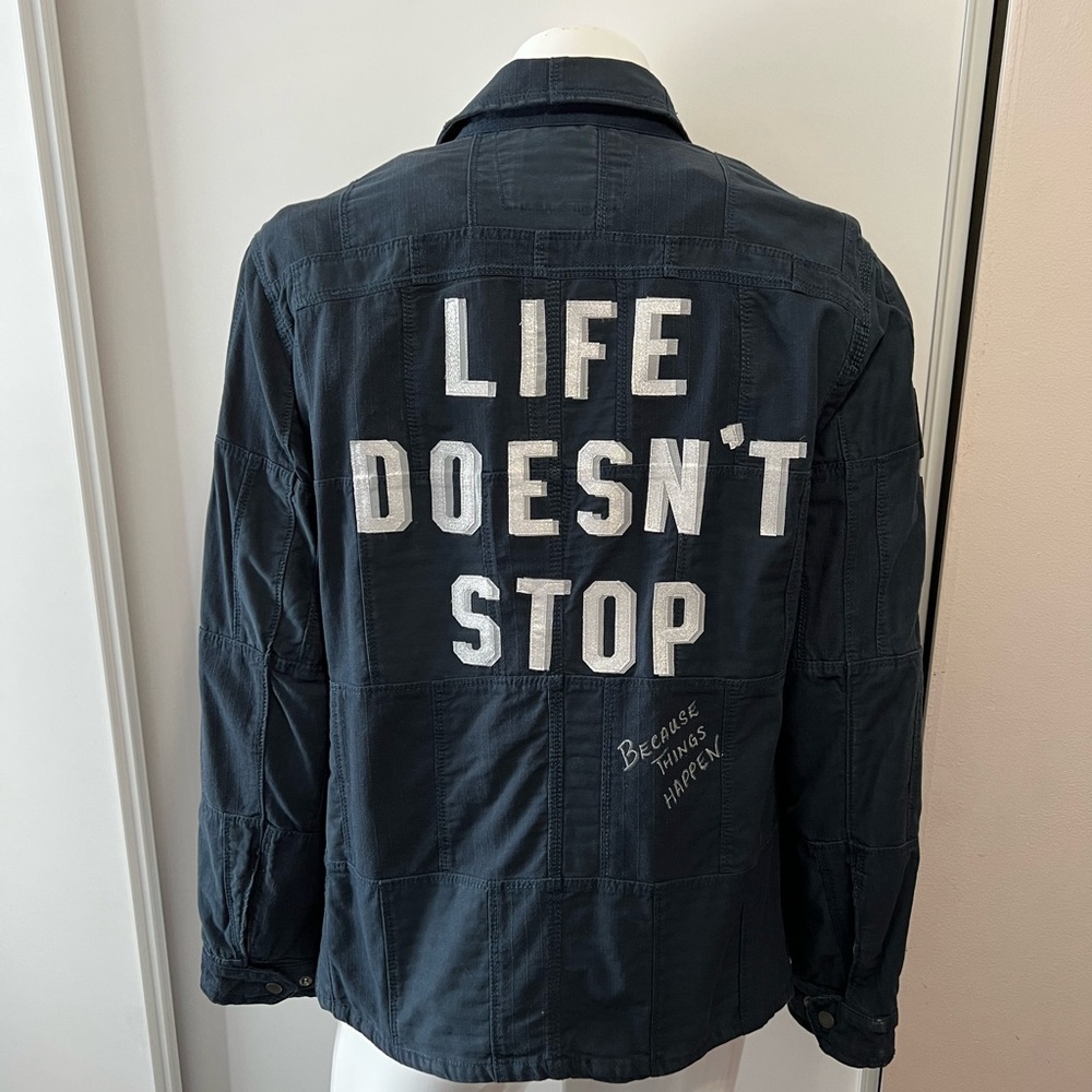 SIGNED MAGIC JOHNSON JERSEY lines this John Varvatos jacket - Custom @ The COOP!